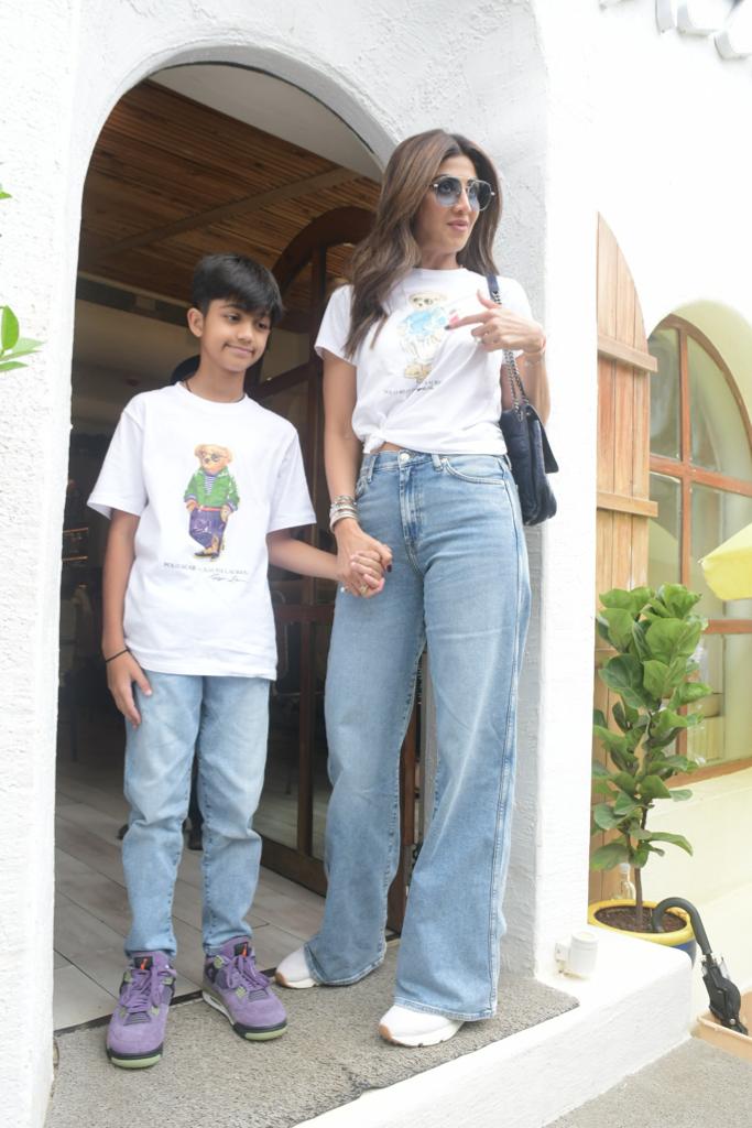 Bollywood icon Shilpa Shetty was seen at a Bandra cafe, dressed in a casual yet stylish ensemble of blue jeans and a white t-shirt. 